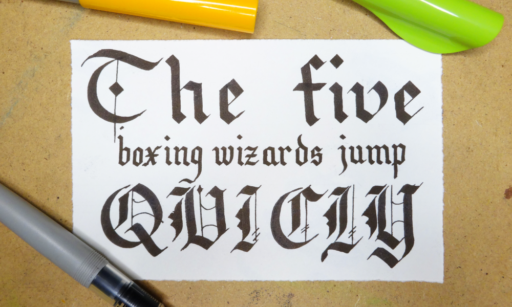 Calligraphy words, "The five boring wizards jump quickly"